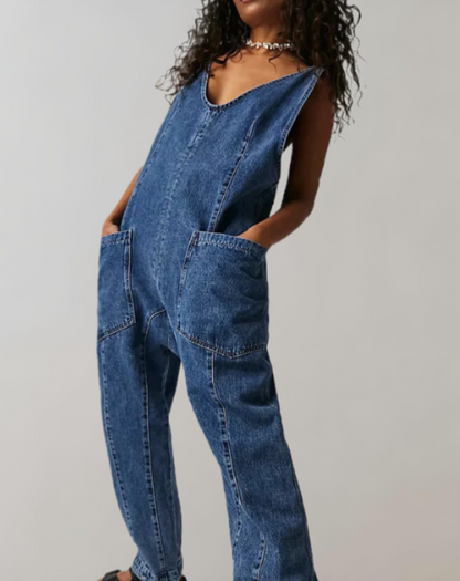 Nadine - Mouwloze denim jumpsuit met diepe V-hals en broek met meerdere zakken